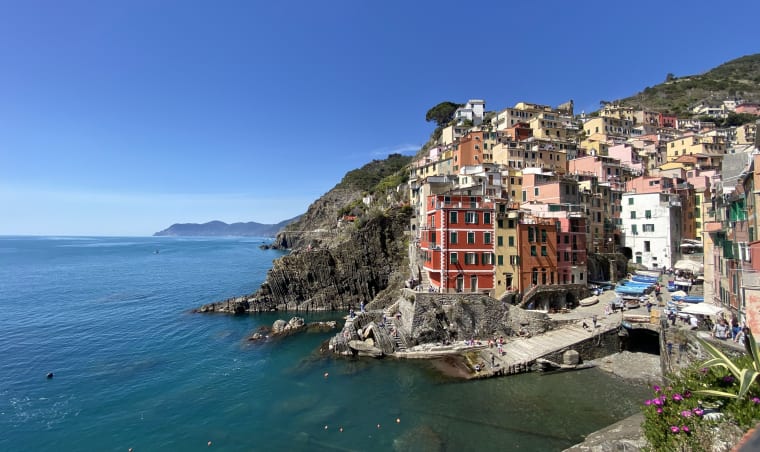 Colorful buildings on a seaside coast in Italy.
